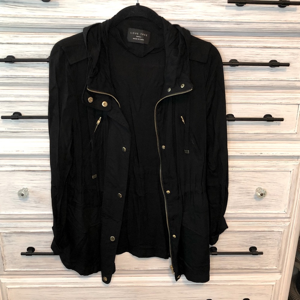 Black cinch waist hooded jacket with gold accents